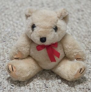 CE Jointed Plush Chubby Bear With Red Satin Bow